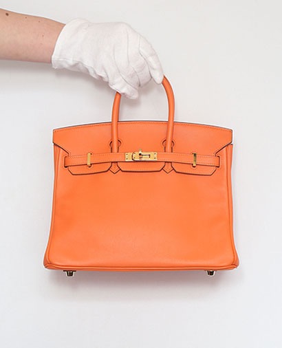 Birkin 25 Swift Leather in Potiron, front view